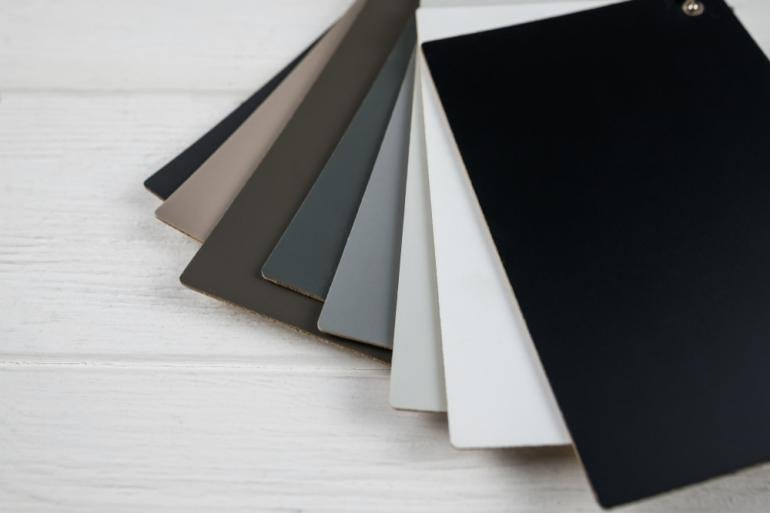 A collection of paper swatches for luxury packaging