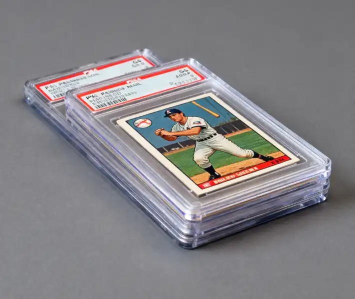 A collection of graded baseball cards in their protective plastic slabs.