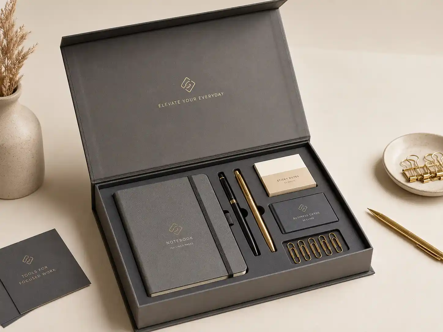 Stationery gift box with notebook and pens in fitted insert