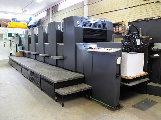 Lithograph printing machine in a factory setting